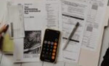 Notebook and paperwork representing Medicare rebate planning for psychology sessions