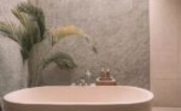 A calm, dimly lit resting space with soft lighting for sensory recovery.