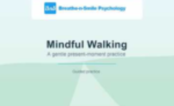 A person walking on a quiet path during a mindful walking practice
